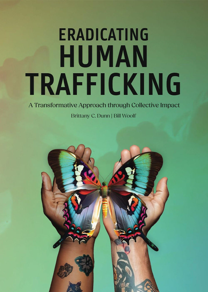 Eradicating Human Trafficking Book Cover