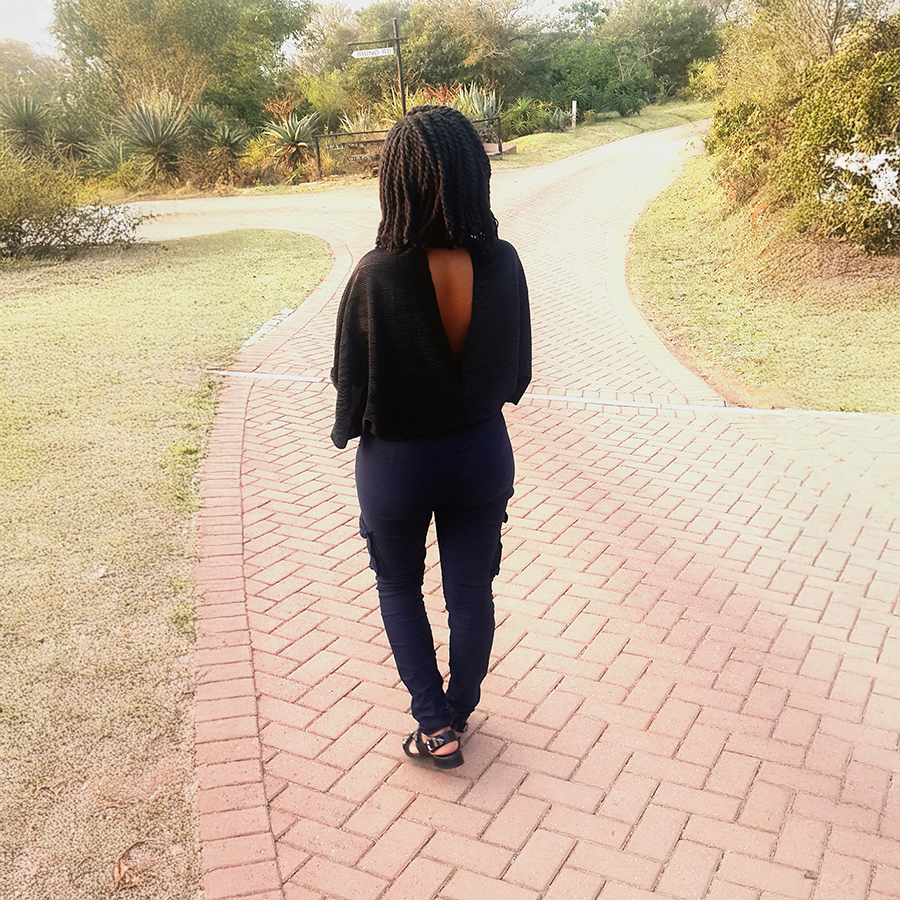 Young Black Woman Facing A Path